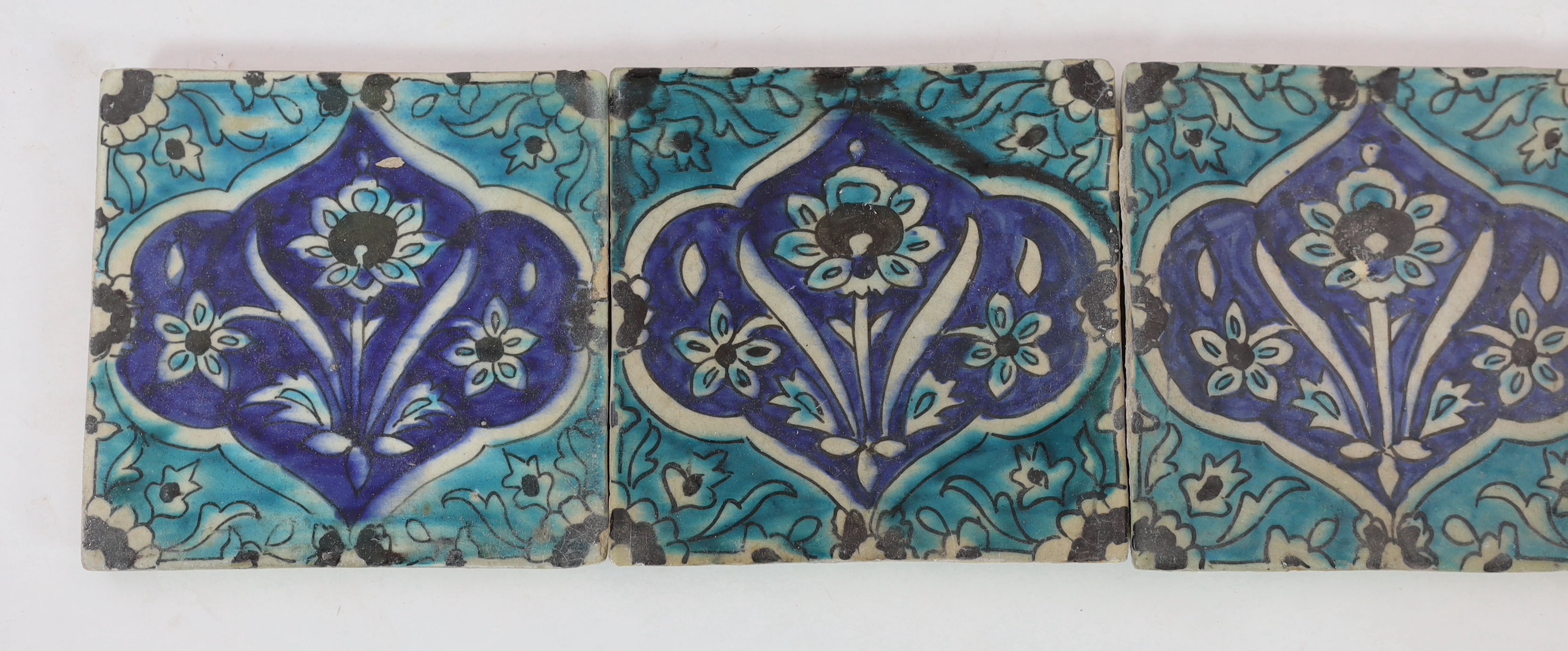 A set of five Persian fritware tiles, Qajar dynasty, 19th century